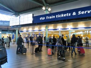 what is the cost of train ticket in amsterdam from the airport to city center